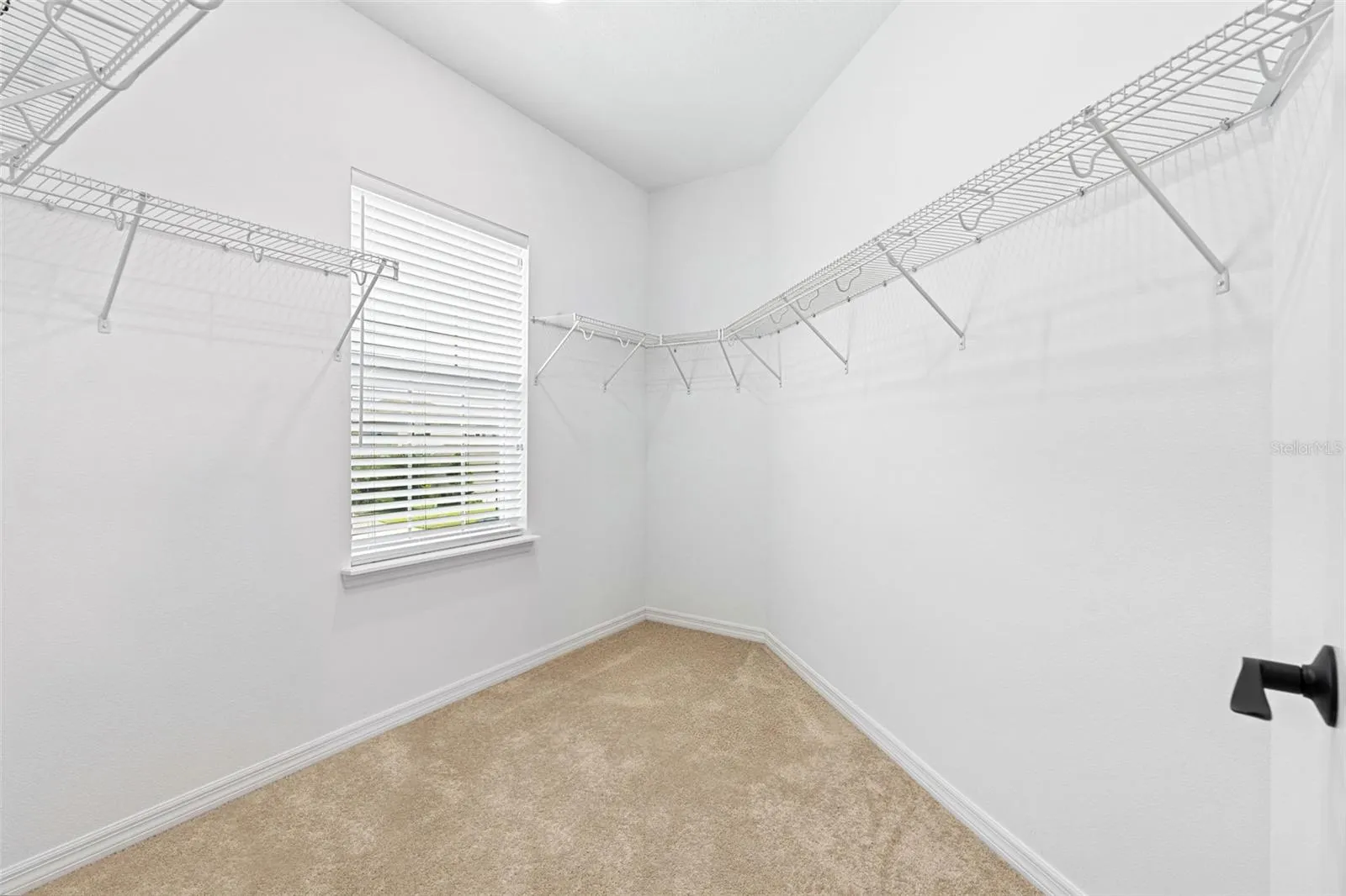 Guest bedroom suite 10x9 walk-in closet.