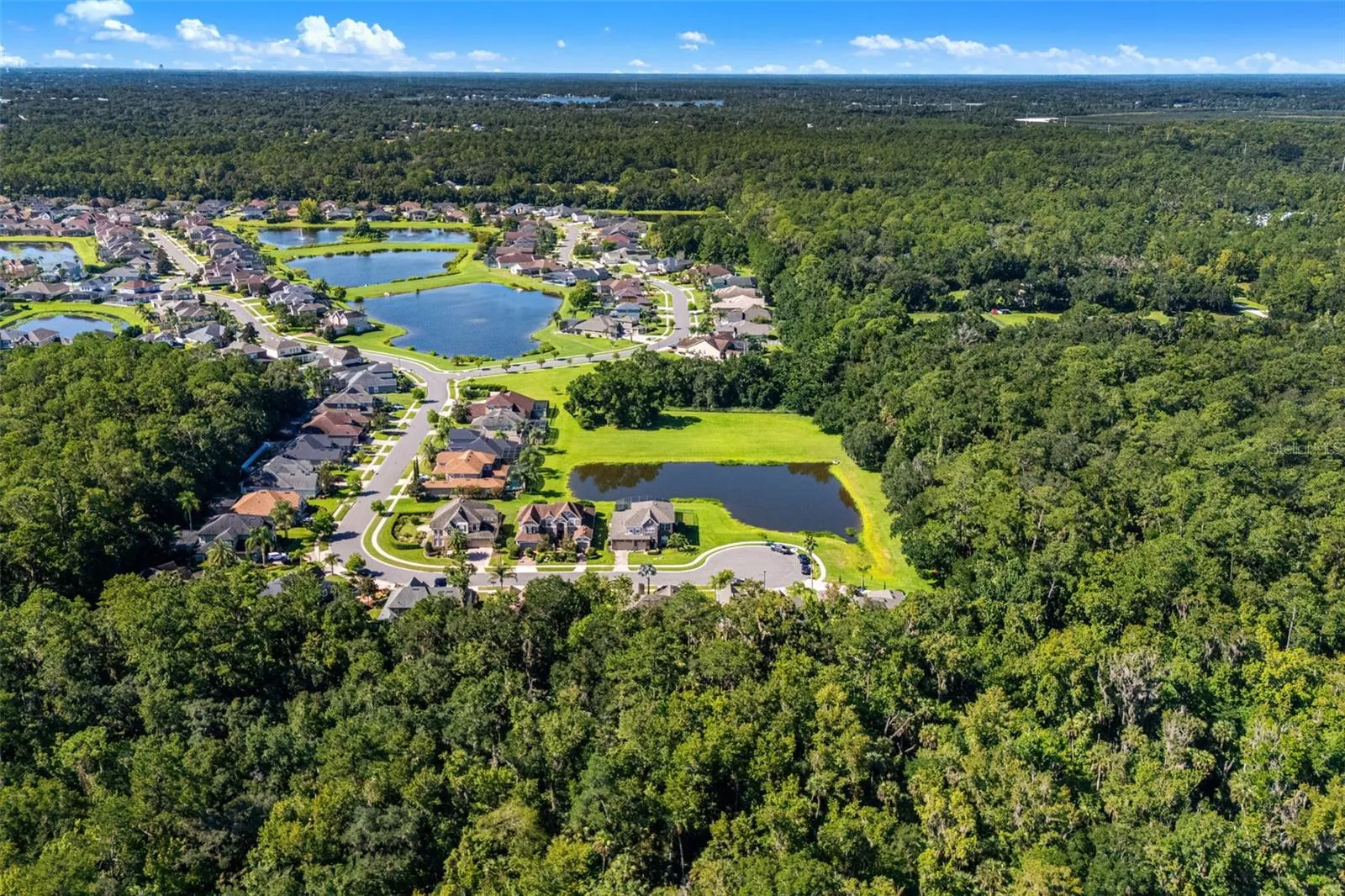 PEACEFUL, PRIVATE and BEAUTIFULLY MAINTAINED, this home offers an exceptional setting with the space, UPDATES, and natural surroundings you've been waiting for.