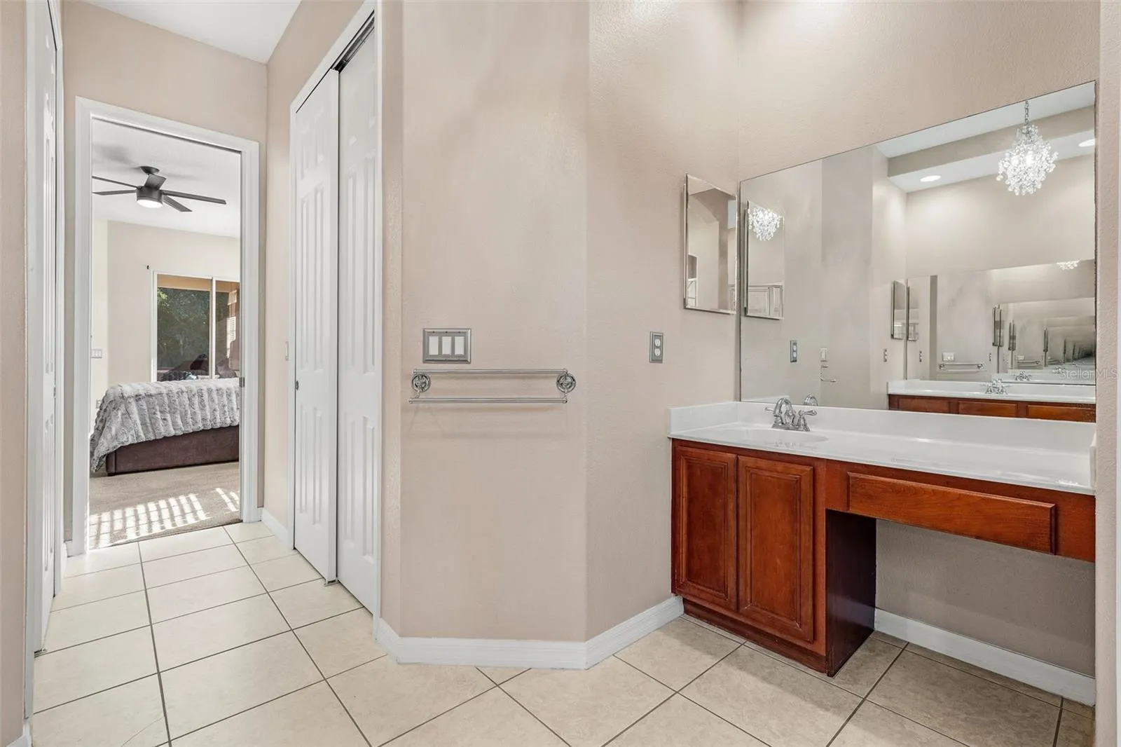 Dual walk-in closets and an en suite Bath complement the Primary Suite.