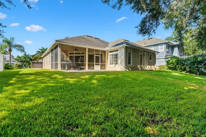 The large lot provides room to enjoy the outdoors, entertain or simply relax and watch the Florida landscape change with the seasons.