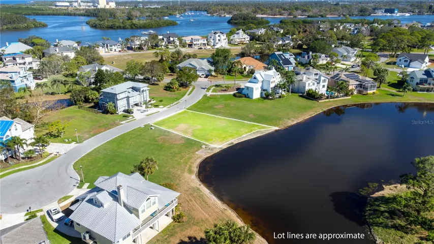 .21 acre level lot with a beautiful pond.