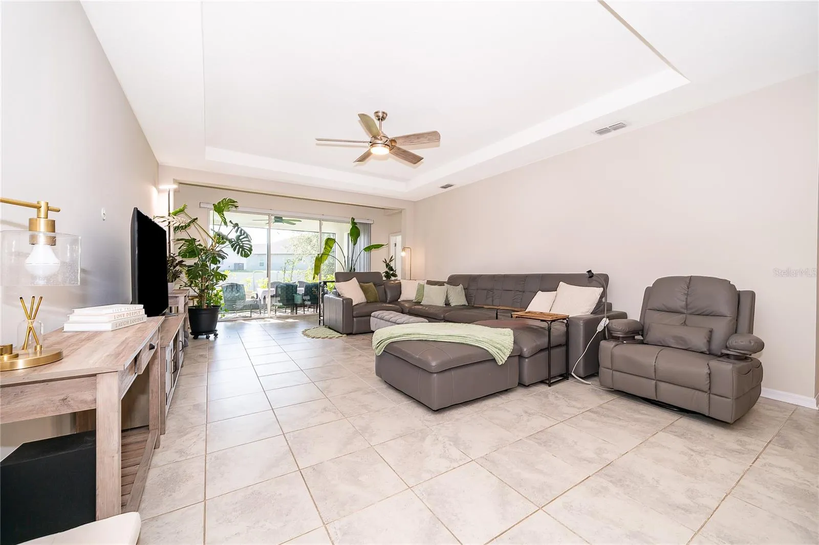 High ceilings and an open layout enhance the home's impressive sense of space and natural flow.