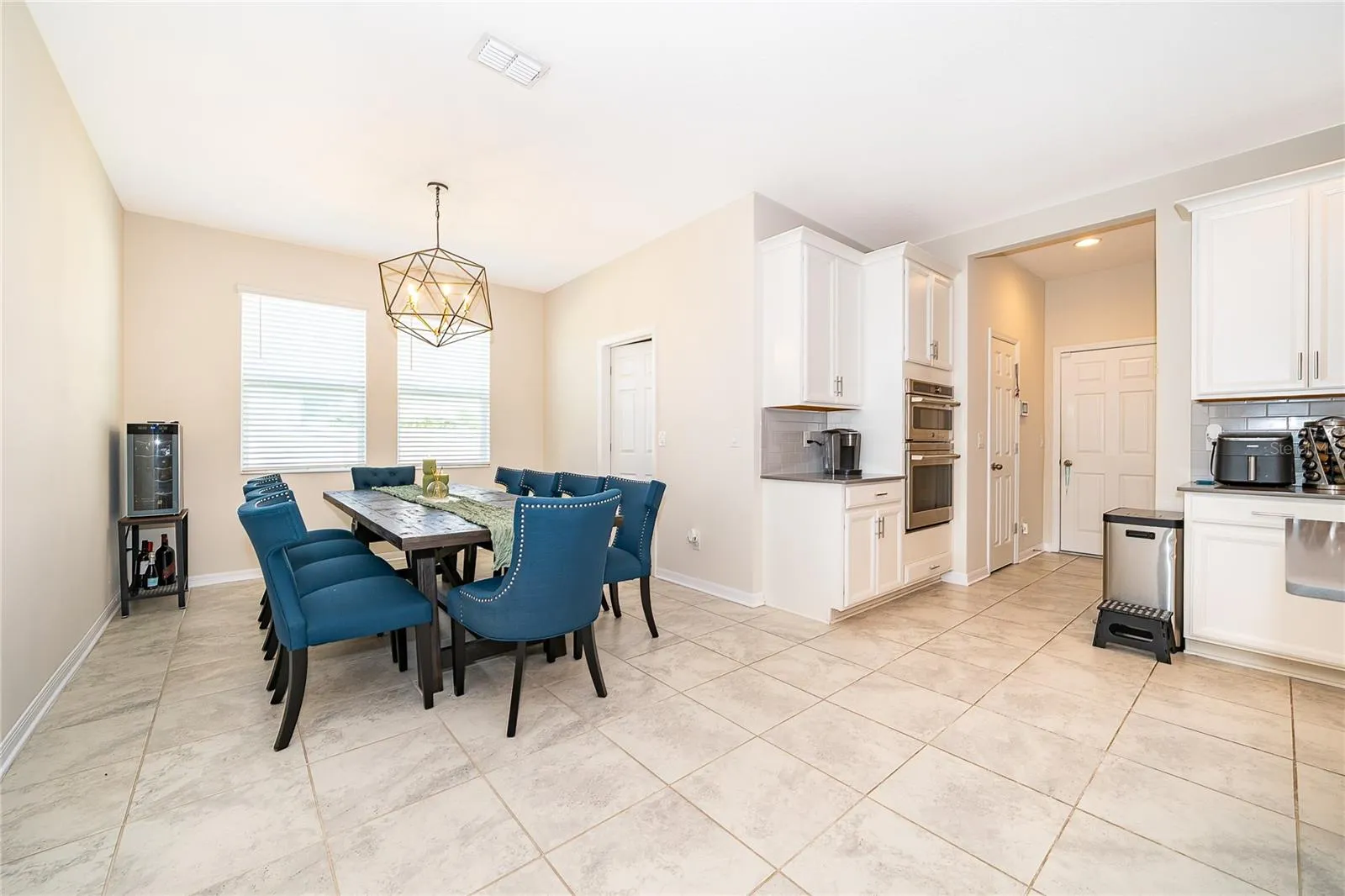 Spacious dining area seamlessly connected to the open living spaces for effortless entertaining.