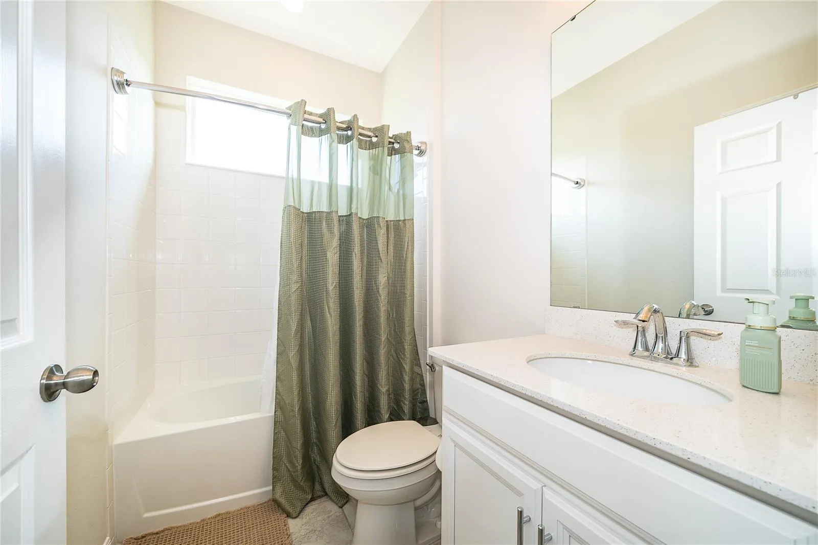 Bright and spacious secondary bedroom offering flexibility for family, guests, or a home office.