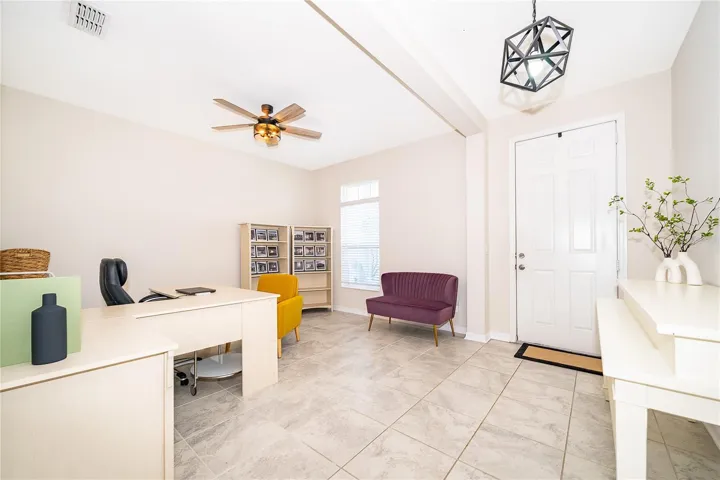 Spacious living area filled with natural light and designed for effortless everyday living and entertaining.