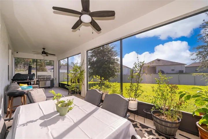 Lanai / Covered Area: Inviting outdoor living area perfect for relaxing, entertaining, and enjoying the Florida lifestyle.