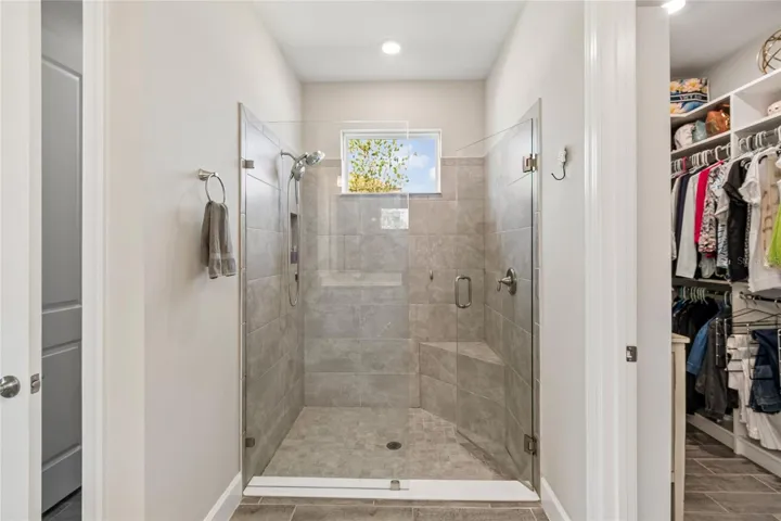 FRAMELESS GLASS WALK-IN SHOWER