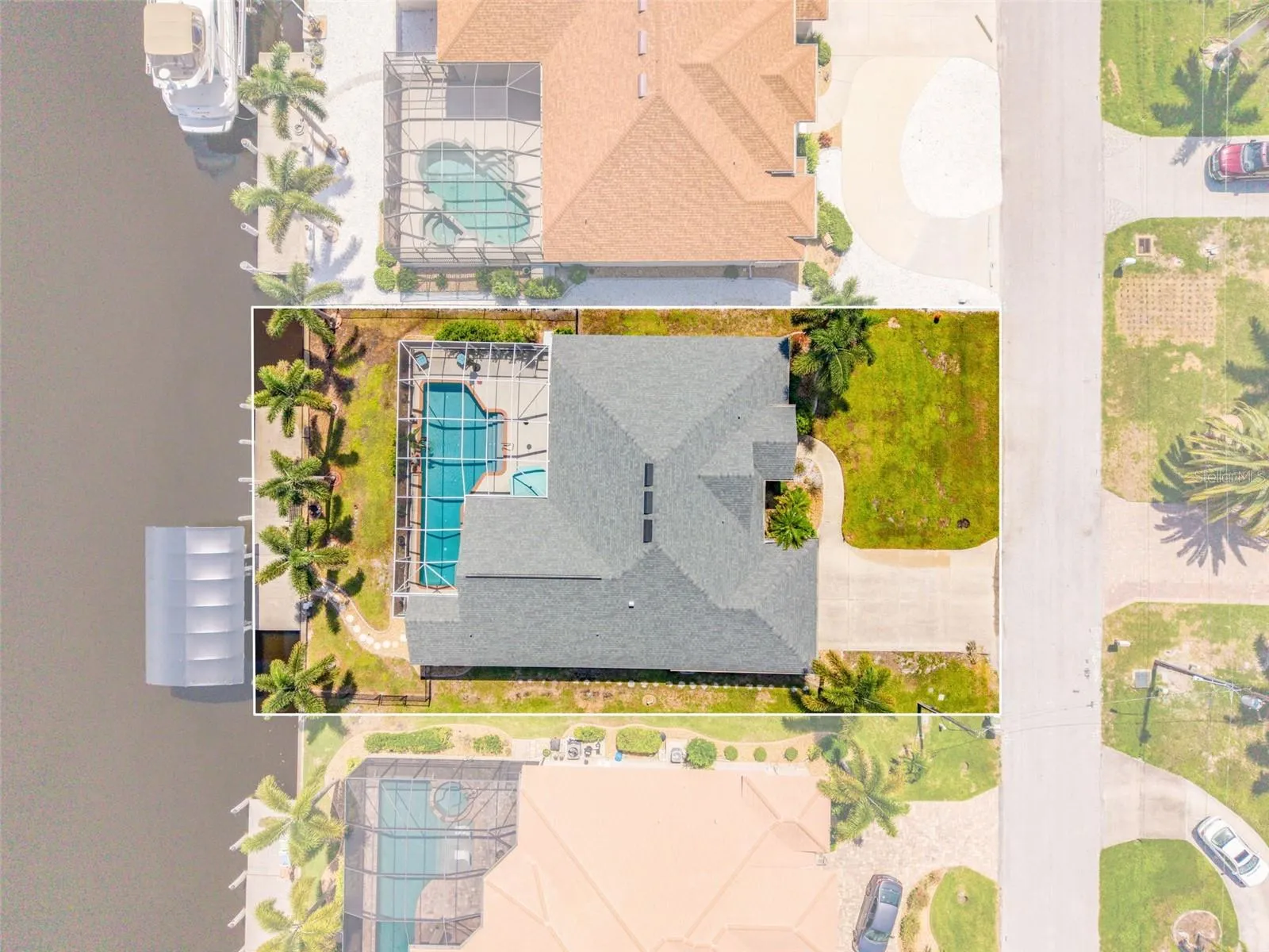 Overhead View of Home, Pool &amp; Sailboat Canal