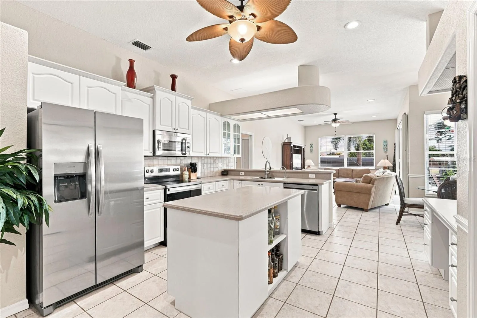 Open Kitchen with Center Island &amp; Stainless Steel Appliances