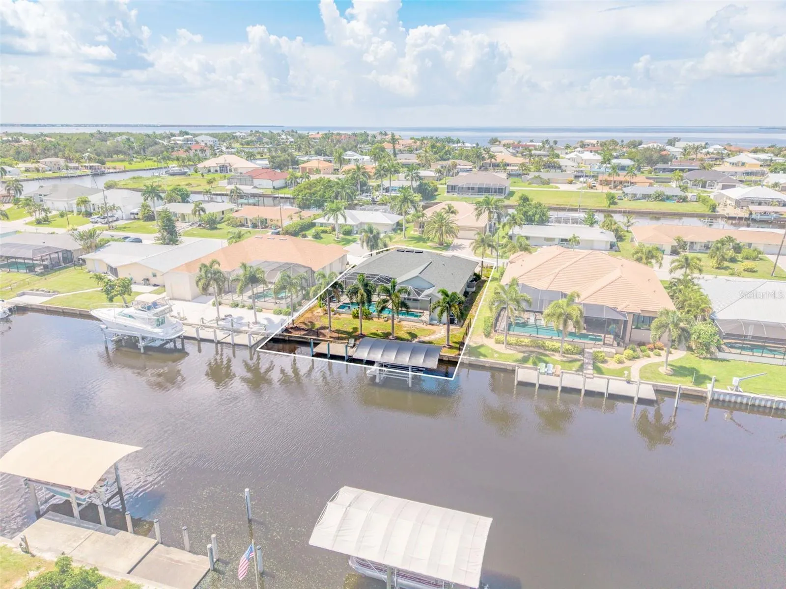 Aerial View of Home, Pool &amp; Sailboat Canal