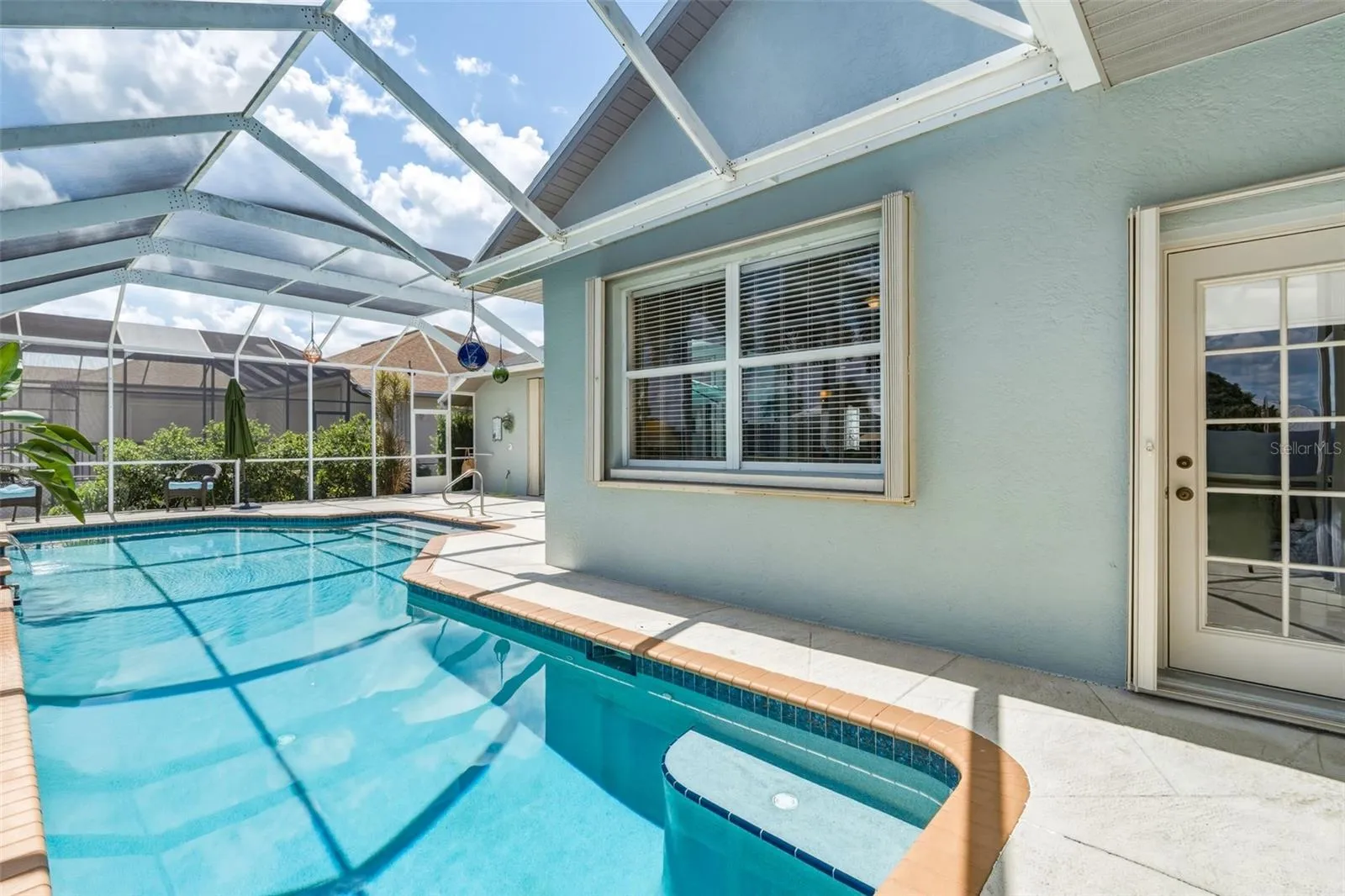 Exspansive Screened Pool Deck with Waterfront Views
