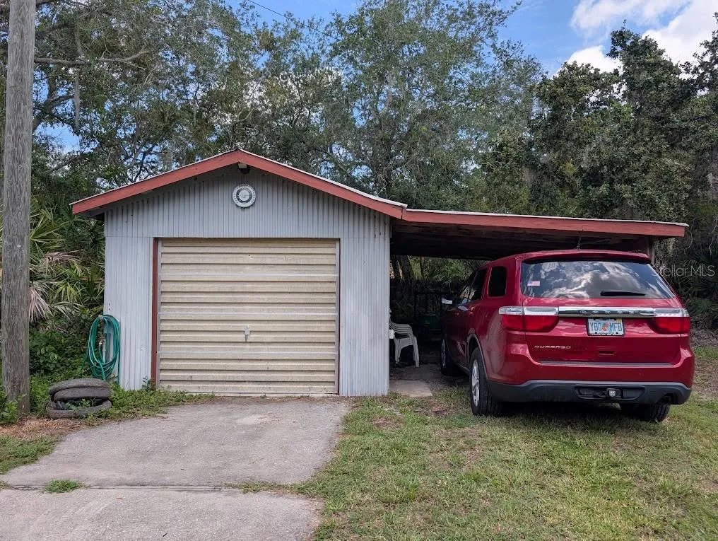 GARAGE-WORKSHOP AND CARPORT