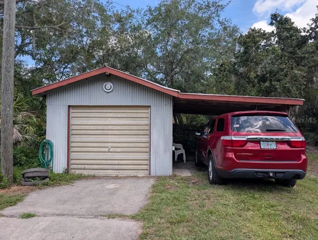 GARAGE-WORKSHOP AND CARPORT