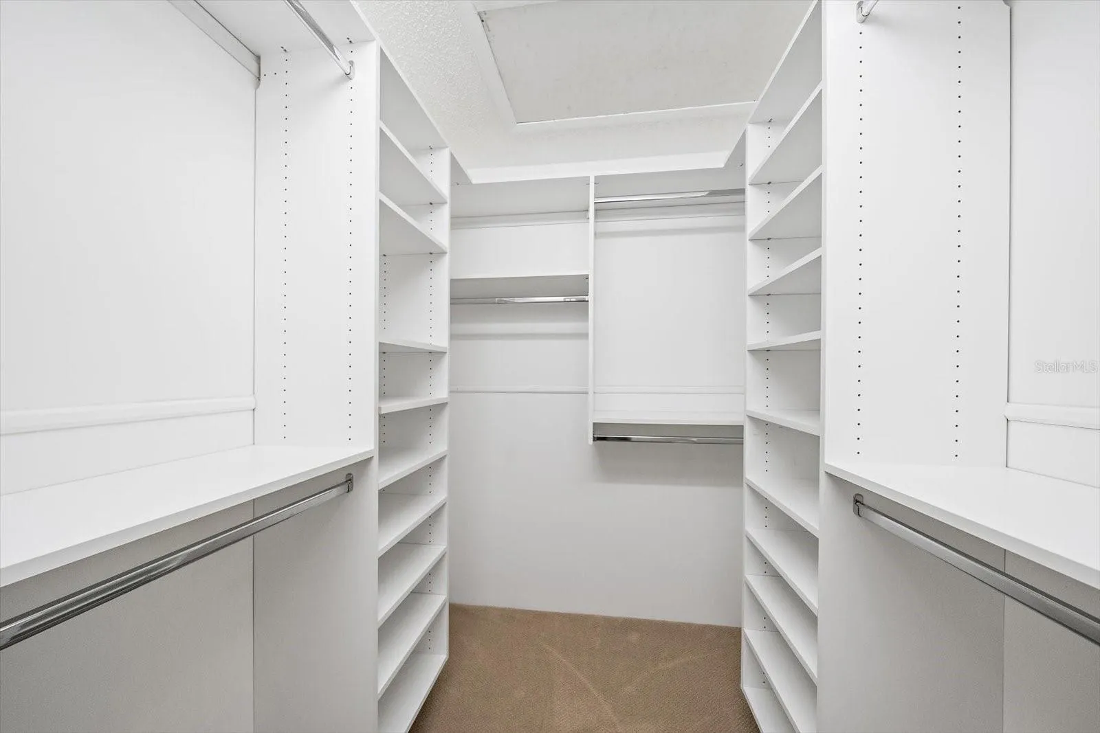 Primary custom walk-in closet