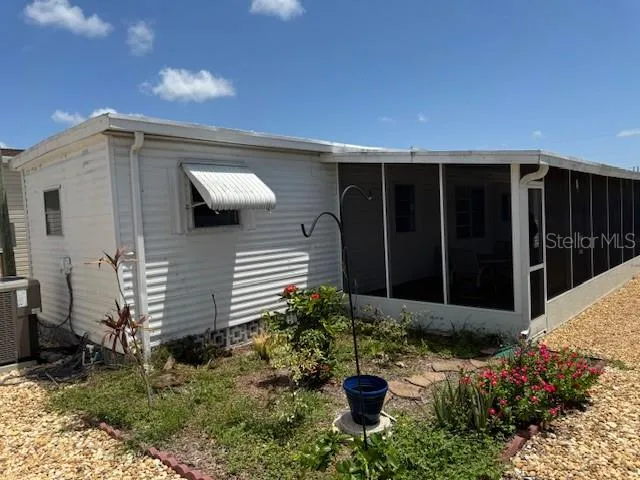 Screened Lanai on Right Side with a Storage Area