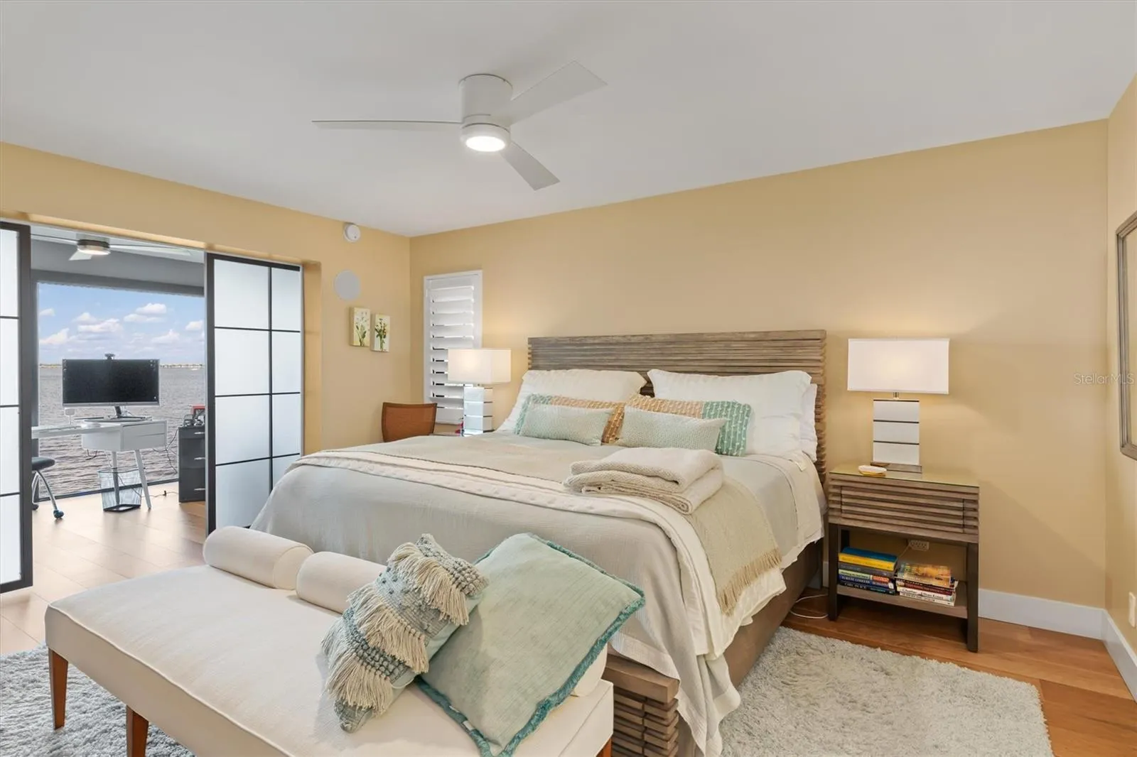 Master bedroom with translucent glass barn doors