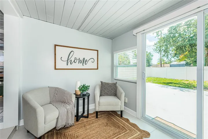 Family Room &amp; Exits to Back Yard &amp; Driveway