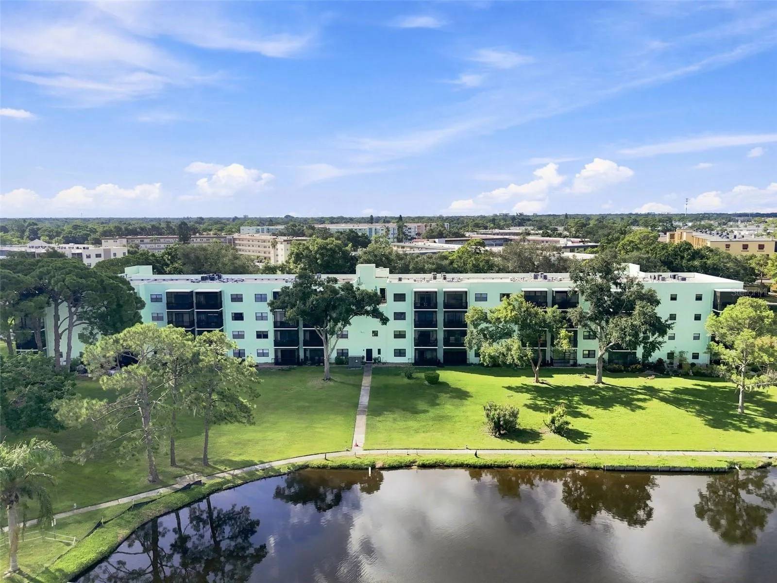 Tranquil pond-facing third floor unit.