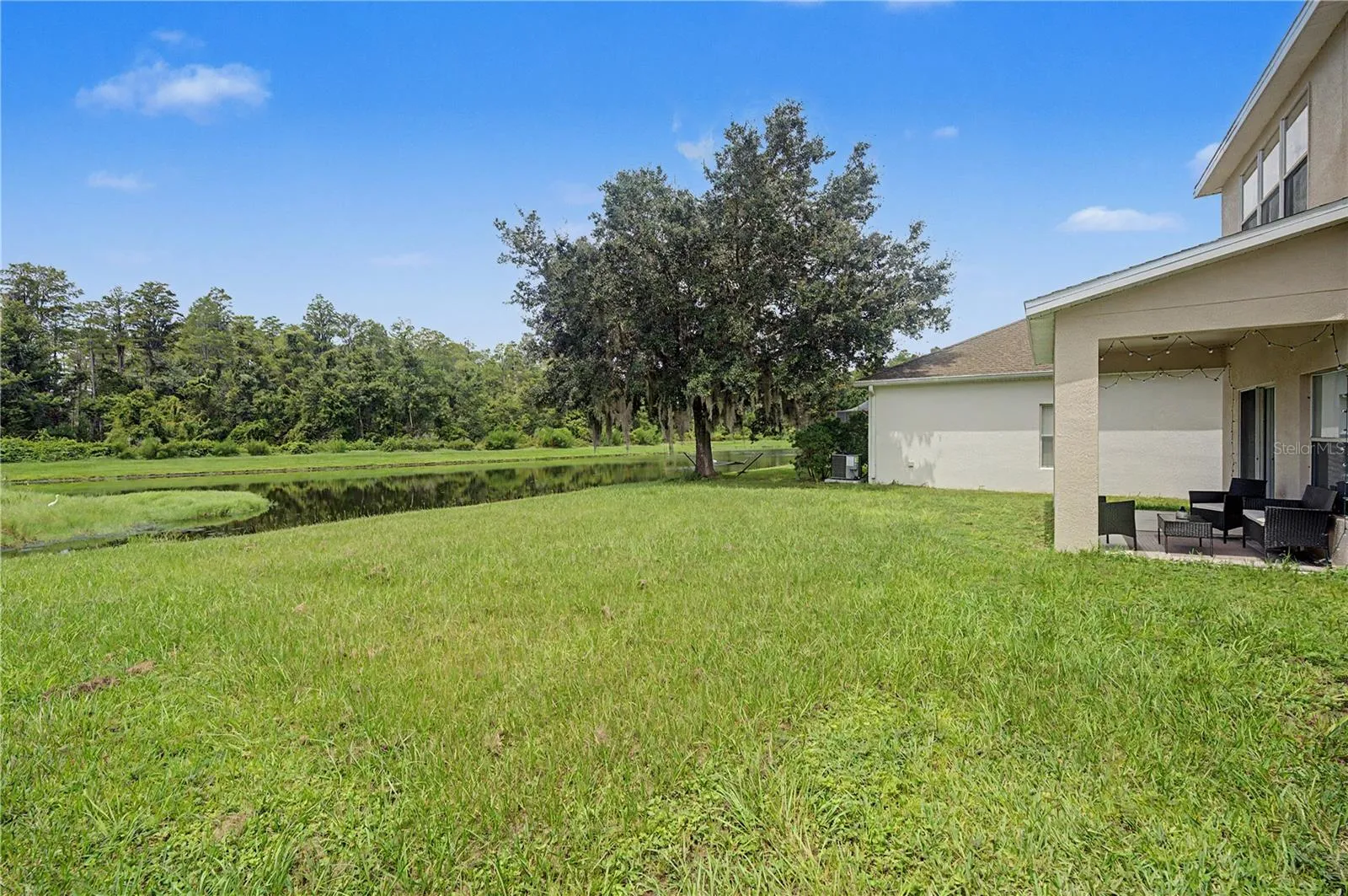 Backyard Overlooking Pond - 9837 Jasmine Brook Circle
