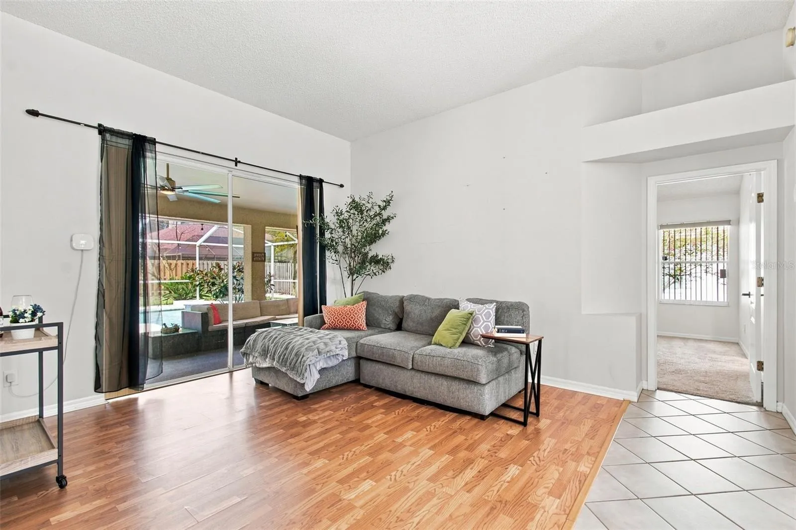 True split floor plan with primary suite privately tucked off of formal living/flex space
