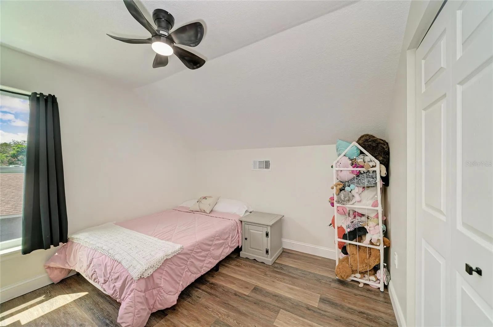 One of 4 spacious bedrooms on the second floor.