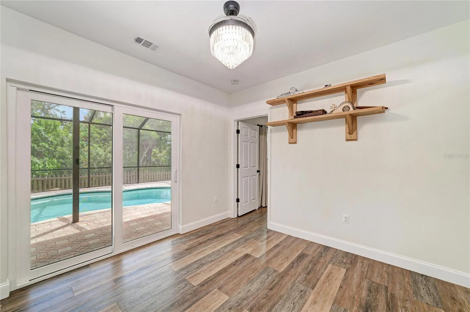 Eat-in dining space with views of pool from the new sliding door.