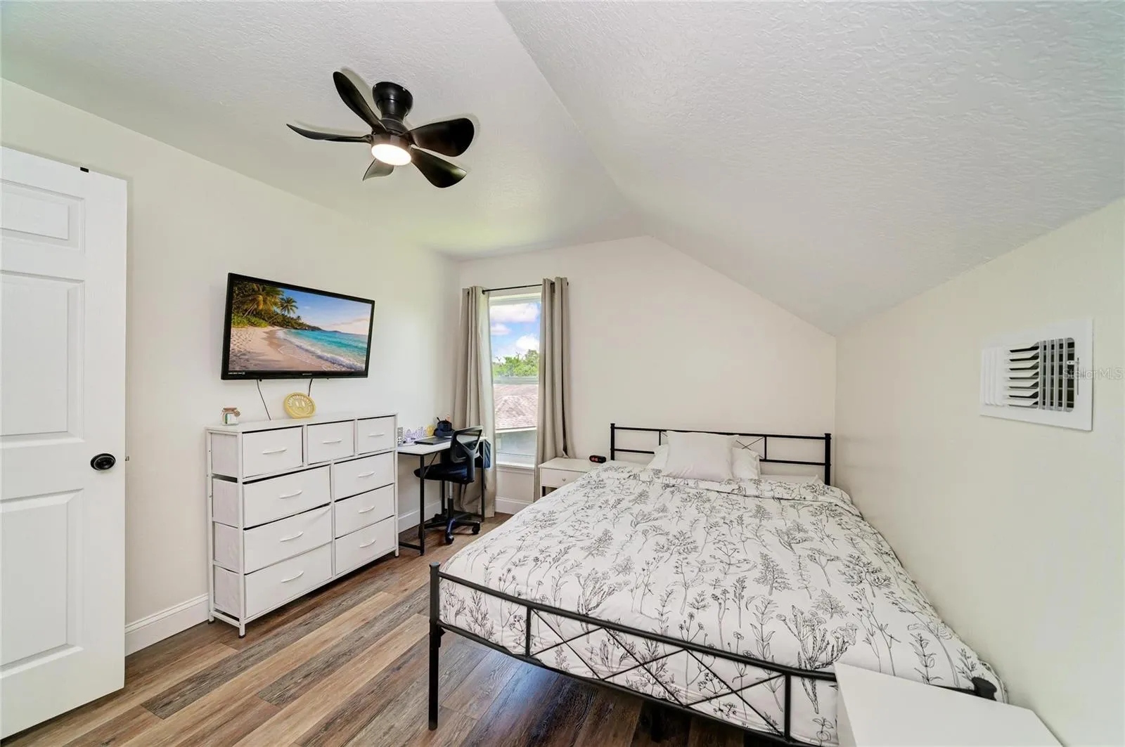One of 4 spacious bedrooms on the second floor.