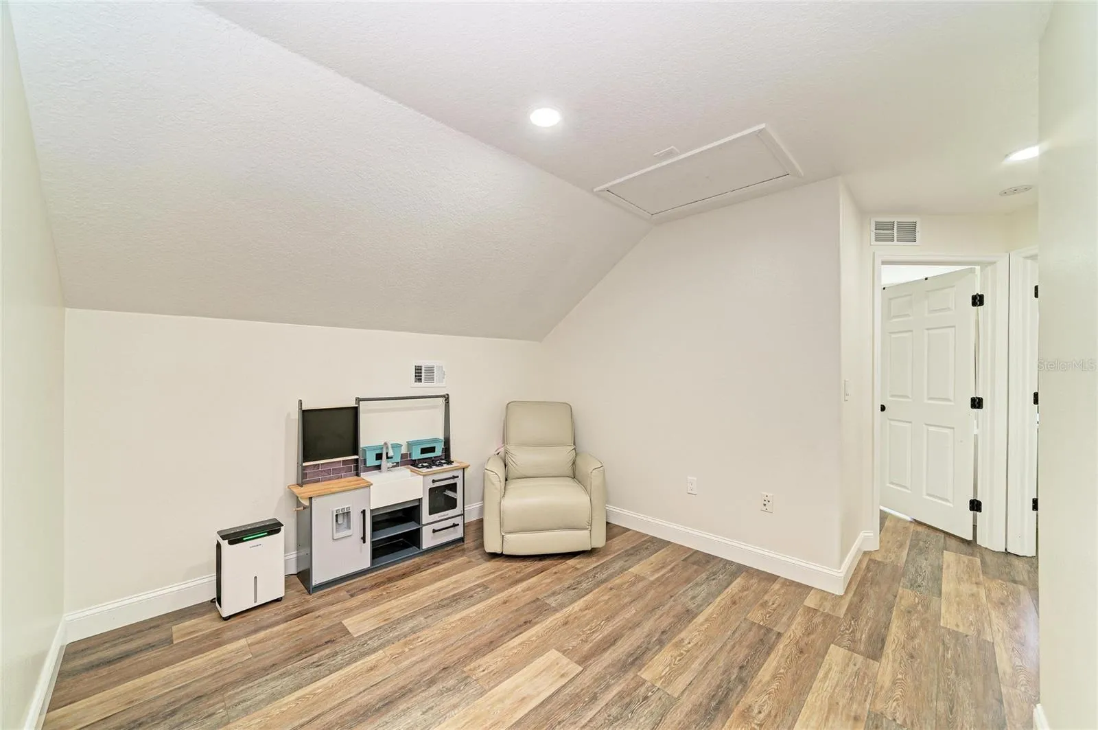 Upstairs loft area for playroom of flex space
