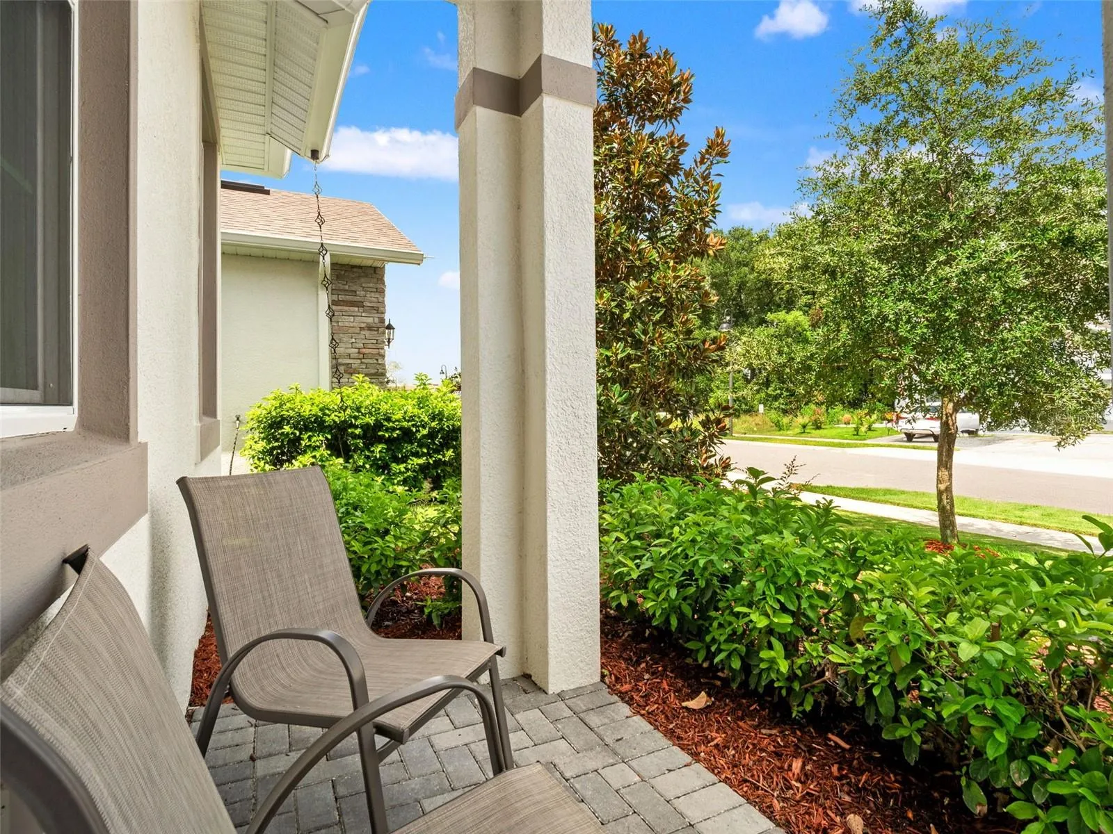 Cozy covered front porch.