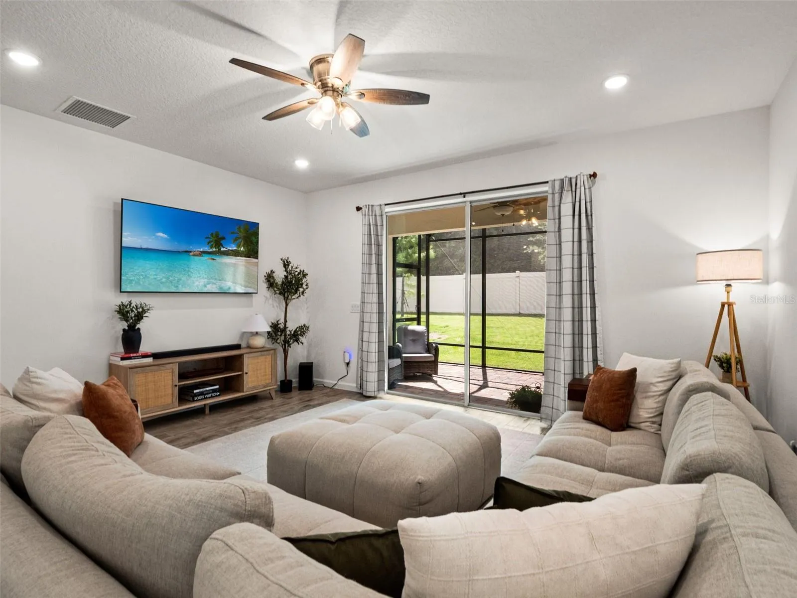 Spacious living room with views to the back lanai.