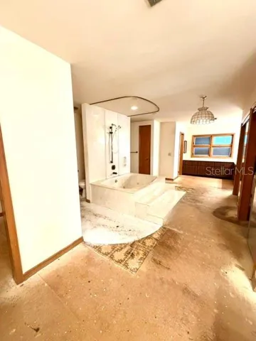 removed carpet in primary bathroom upstairs