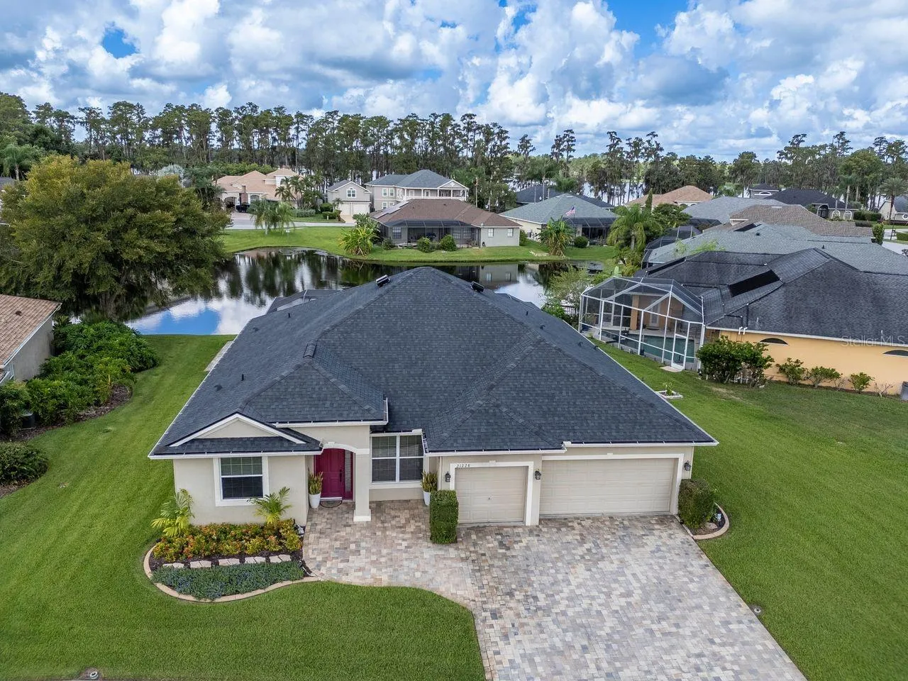 0.32 acre lot with pond views and privacy.