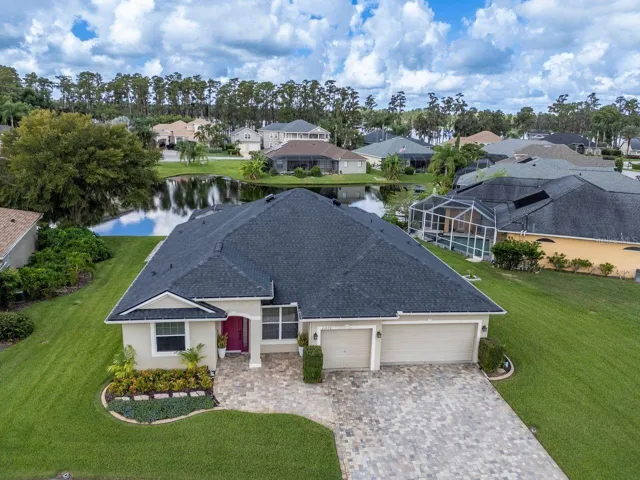 0.32 acre lot with pond views and privacy.