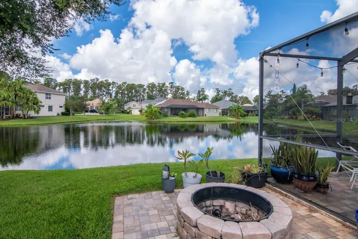 Extended paver lanai with fire pit and gorgeous views.