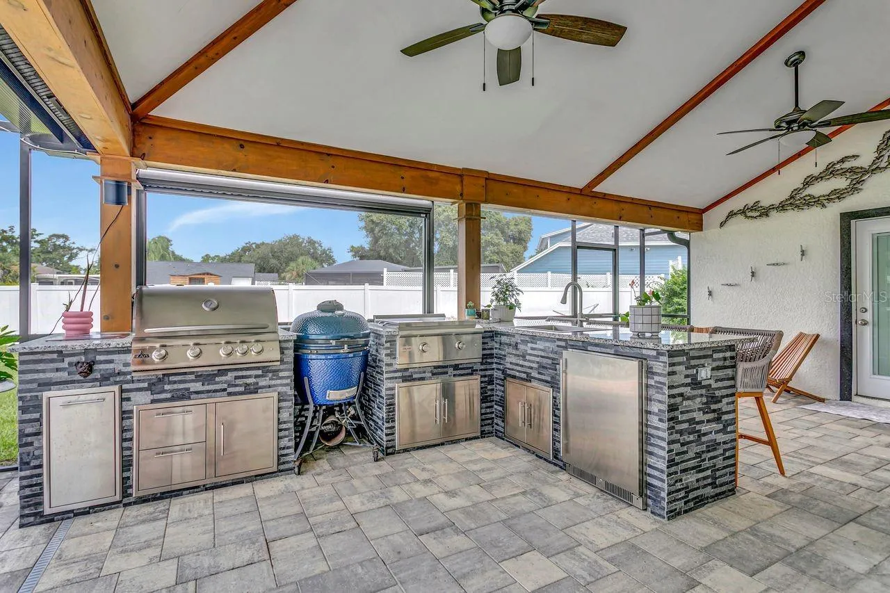 Summer Kithen with full stainless appliances, refrigerator, grill, etc.
