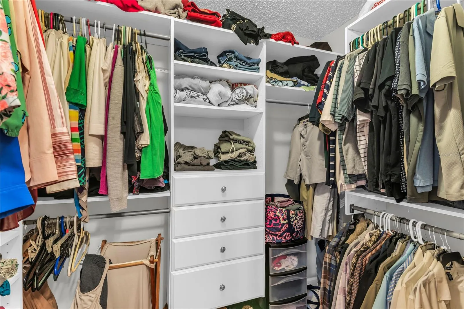 Owner's Walk-in Closet With Built Ins