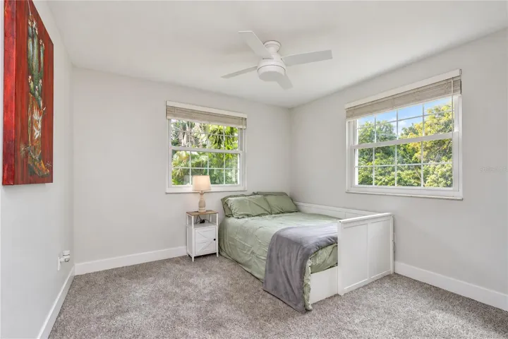 Comfortable secondary bedroom with easy access to the remodeled guest bath