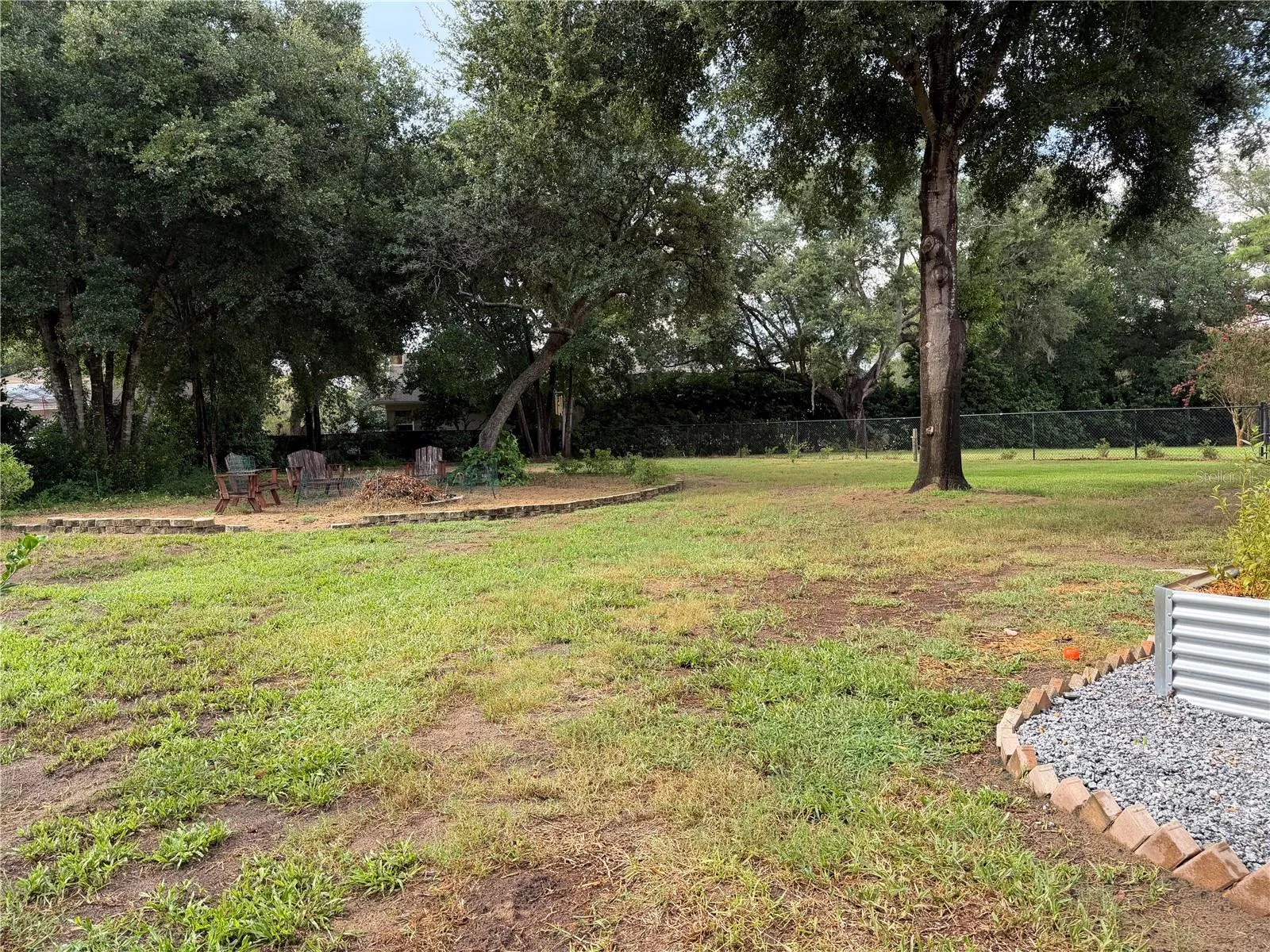 Left side- Large side yard with fire pit