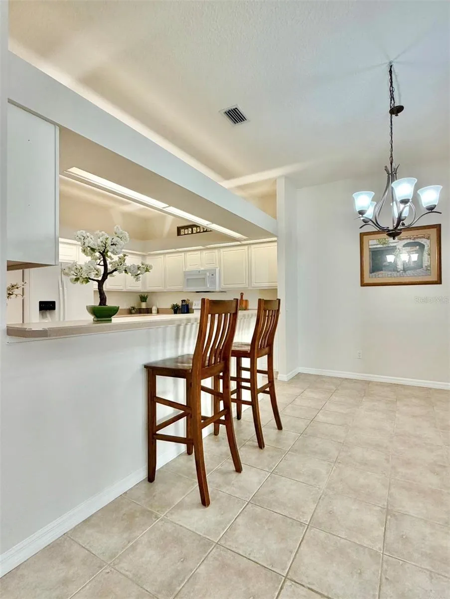 The breakfast bar can easily fit four barstools.