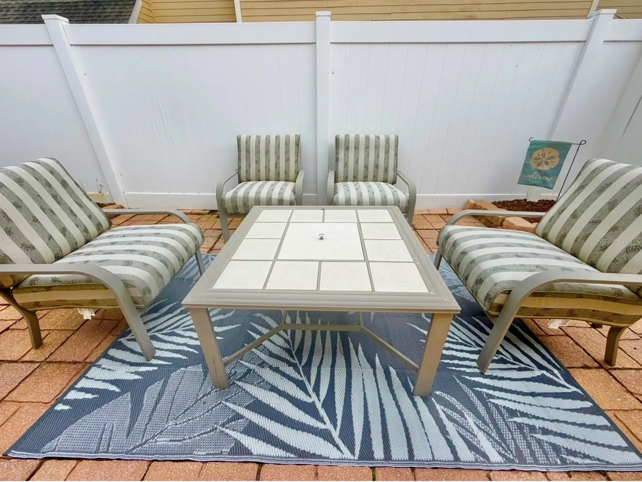 The very private and fenced-in back patio is spacious and has lots of space to enjoy.