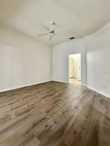 The Primary Bedroom is really spacious and the ensuite is seen through the open door.
