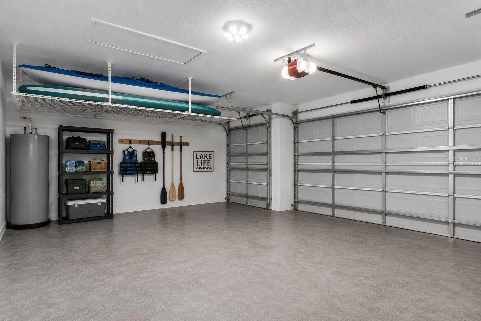 Virtually Staged. Ample space to store your kayak, canoe and lake gear in your 3 car garage.