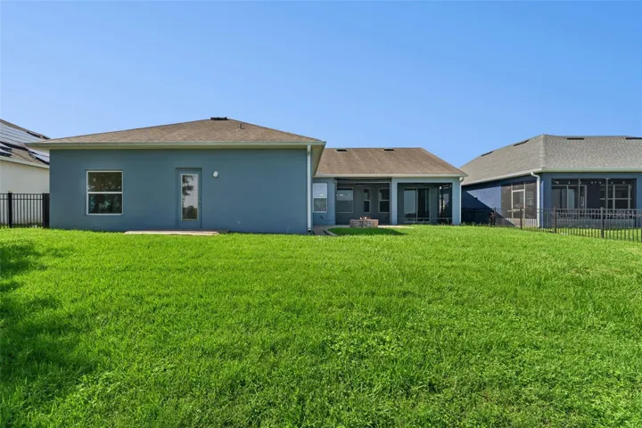 Large backyard with plenty of room to add your own private pool.