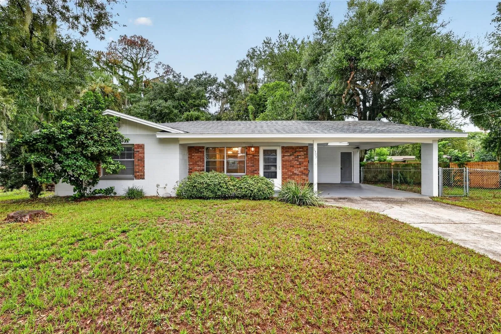 Welcome to 1305 Orange Avenue! A solid 2 bedroom/2 Bath Home w/ Covered Parking