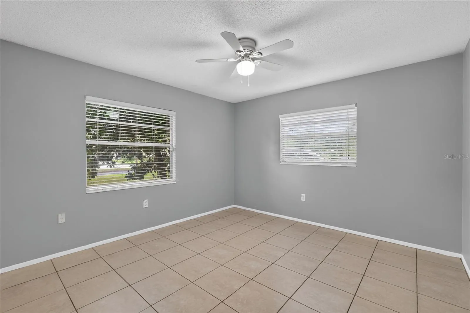Second Bedroom Offers Good Natural Light and Tile flooring