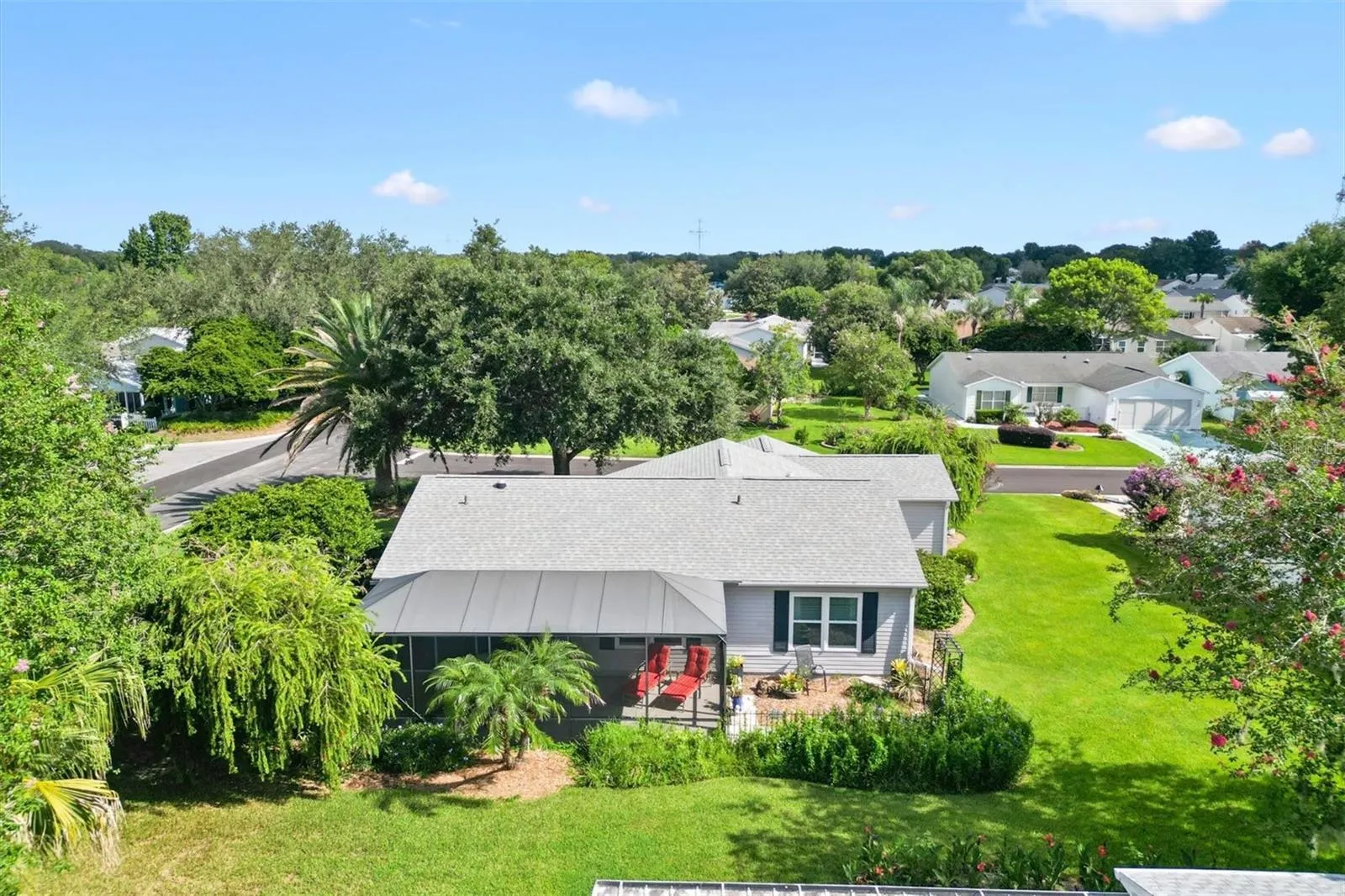 SCREENED IN LANAI AND OUTSIDE FENCED IN GARDEN AREA OR PET AREA