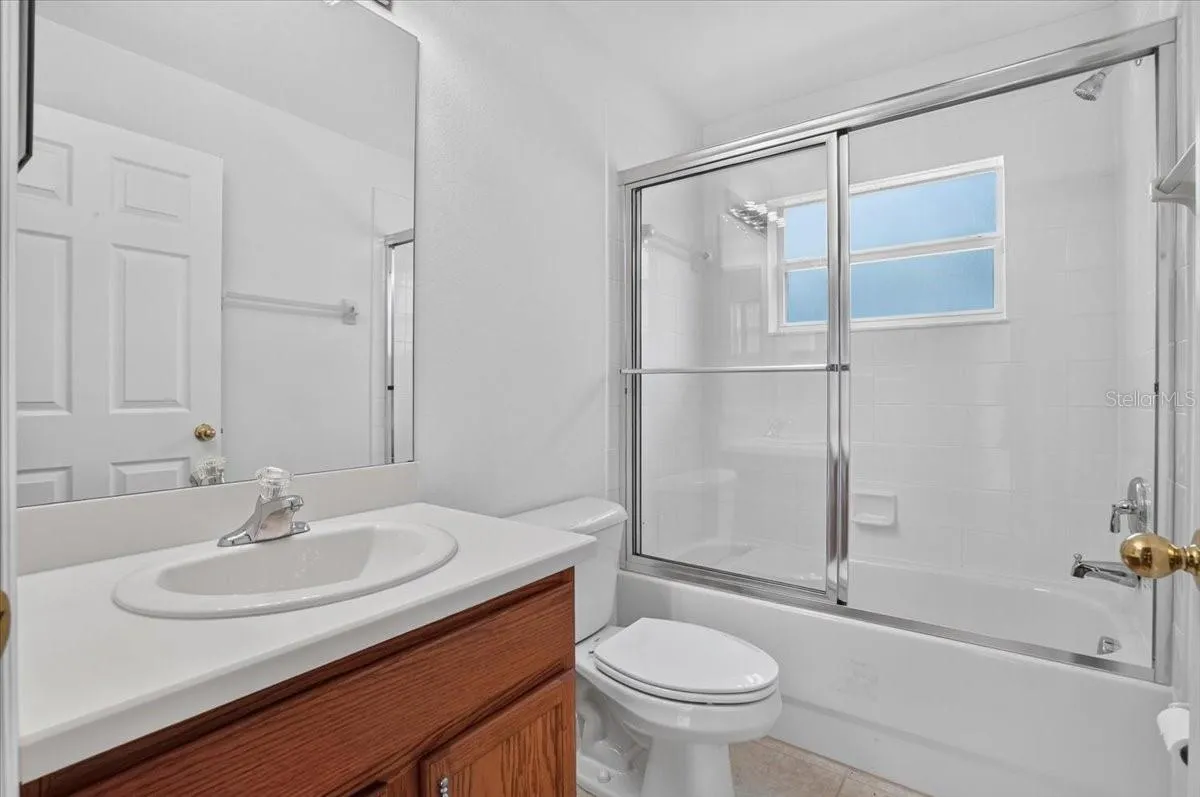 Bathroom 3 next to door out to pool