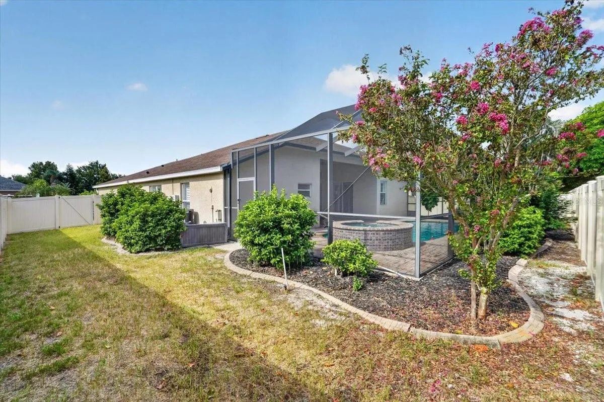 Side yard with single gate and pool equipment
