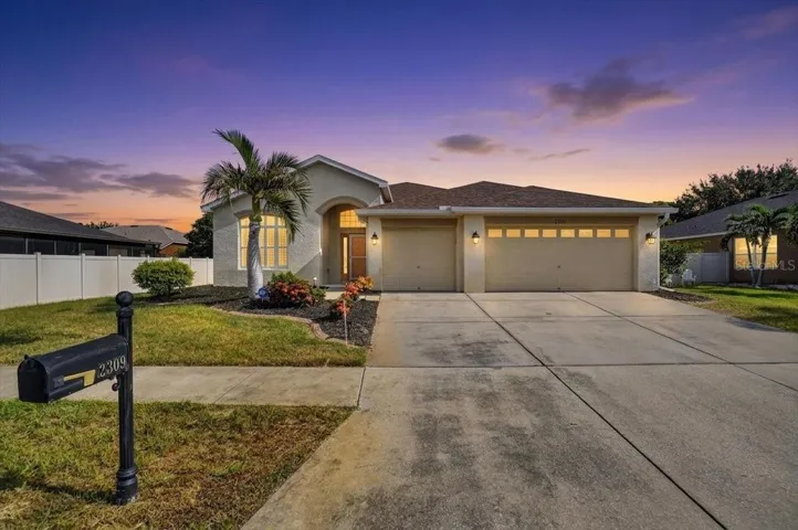 Front with 3 car garage