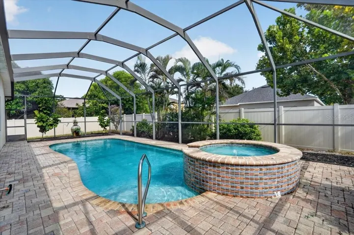 Partially elevated spa and salt warer pool